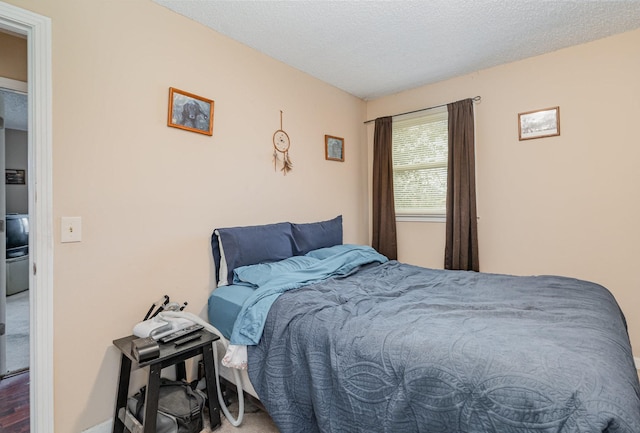 bedroom featuring a textured ceiling