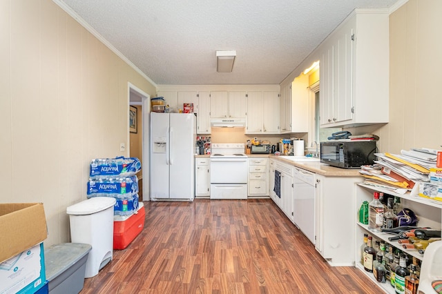 kitchen with white cabinetry, white appliances, dark hardwood / wood-style flooring, a textured ceiling, and sink