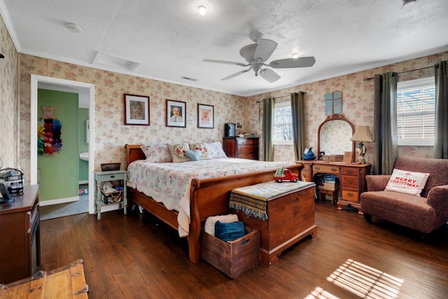 bedroom featuring a textured ceiling, ceiling fan, dark hardwood / wood-style floors, and ornamental molding