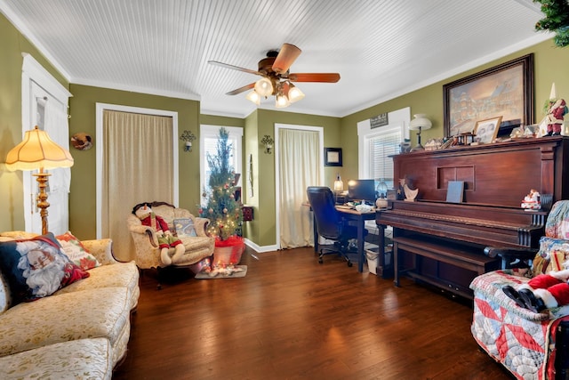 interior space with ceiling fan, dark hardwood / wood-style flooring, and crown molding