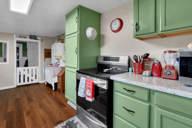 kitchen featuring electric stove, dark hardwood / wood-style flooring, and green cabinets