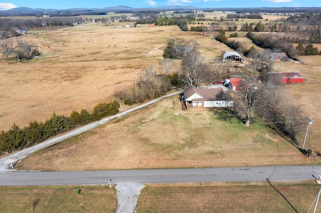 bird's eye view with a mountain view and a rural view