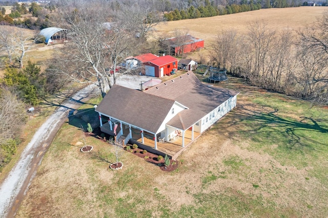 birds eye view of property featuring a rural view