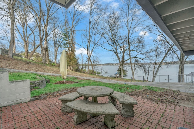 view of patio featuring a water view