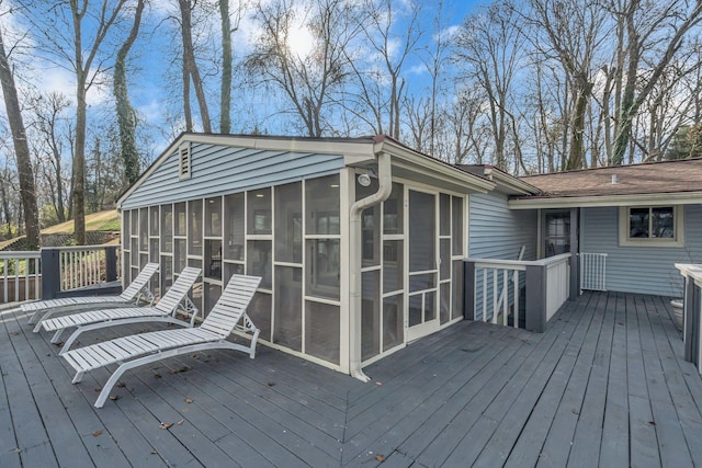 deck with a sunroom