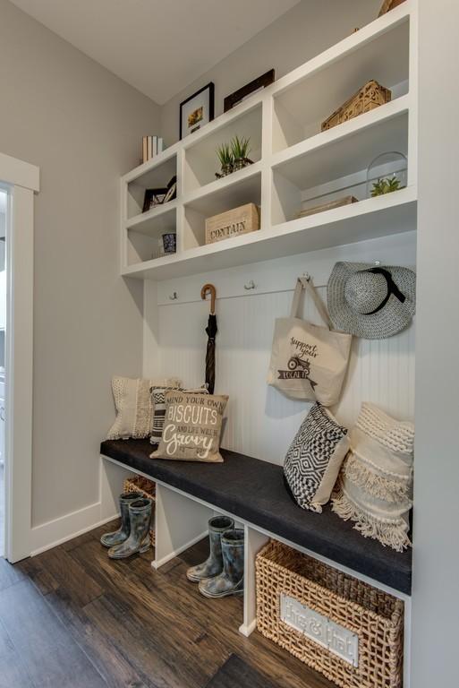 mudroom with dark wood-type flooring