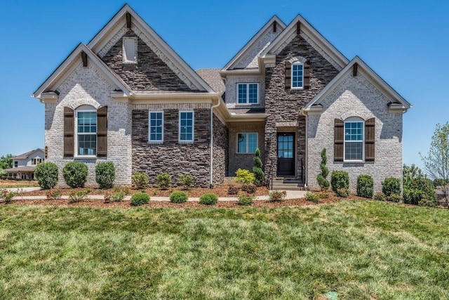 view of front of home with a front yard