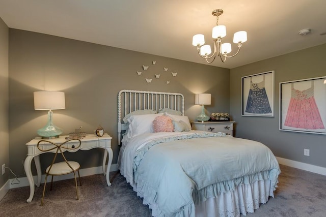 bedroom with carpet floors and a chandelier