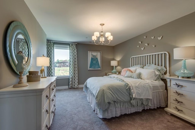 bedroom with carpet and an inviting chandelier