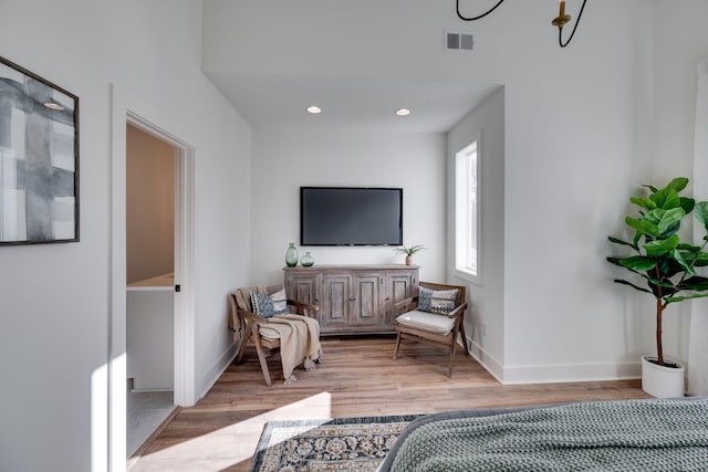 sitting room with light hardwood / wood-style floors