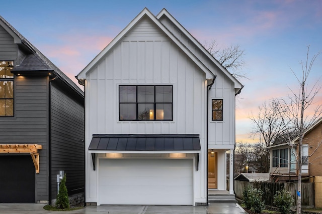 modern farmhouse featuring a garage