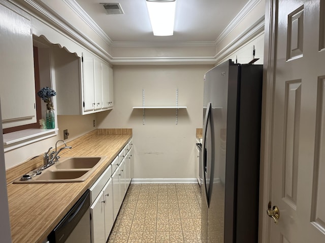 kitchen with white cabinets, crown molding, sink, and stainless steel appliances