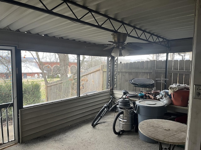 sunroom featuring a wealth of natural light and ceiling fan