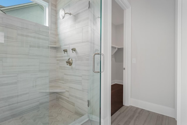 bathroom with an enclosed shower