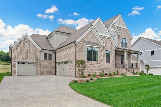 view of front facade with a garage and a front yard