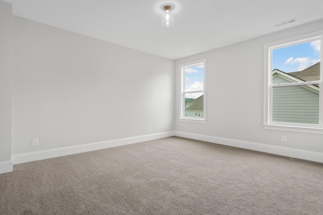 view of carpeted spare room