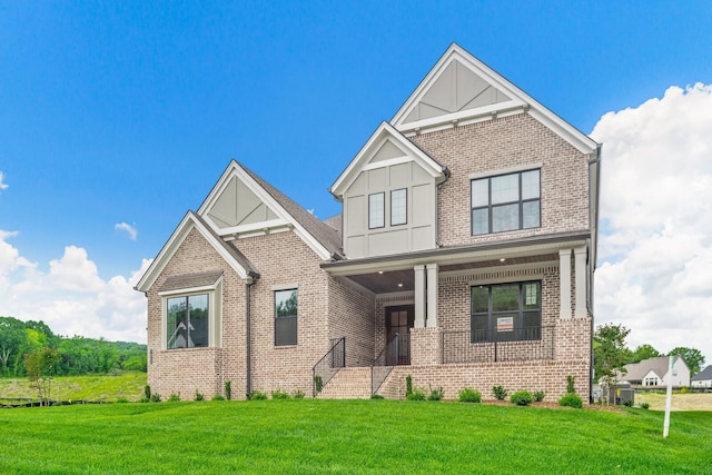 view of front of home with a front lawn