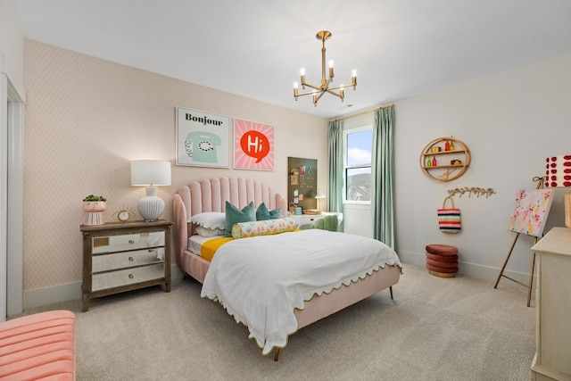 bedroom featuring light carpet and a chandelier