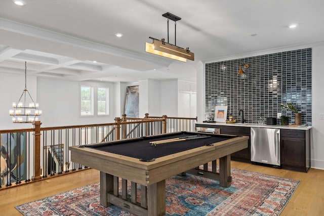 rec room with coffered ceiling, sink, billiards, light hardwood / wood-style flooring, and beamed ceiling