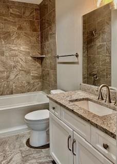 full bathroom featuring vanity, toilet, and tiled shower / bath