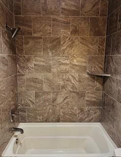 bathroom with shower / bath combination