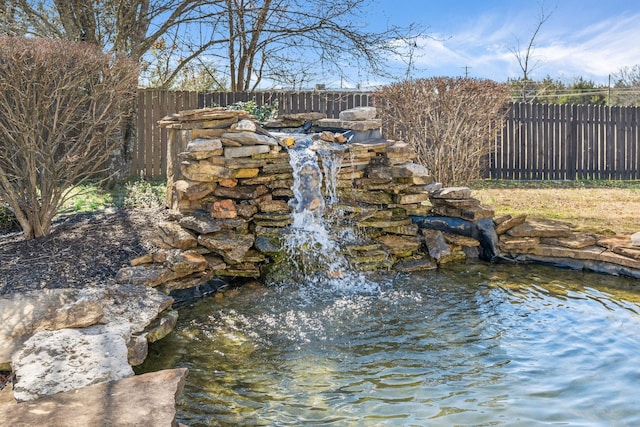 exterior details featuring fence