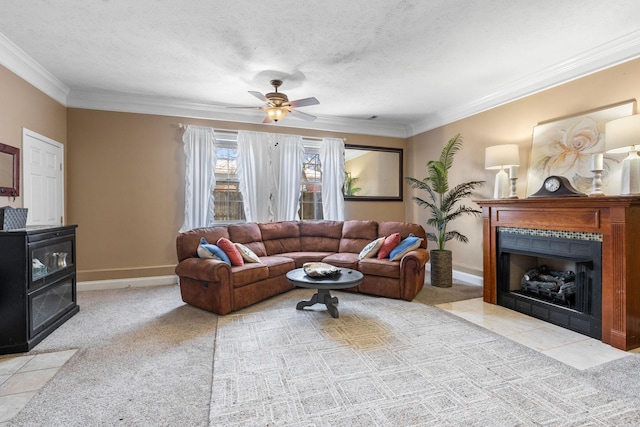 living area featuring a textured ceiling, a tiled fireplace, light carpet, and crown molding