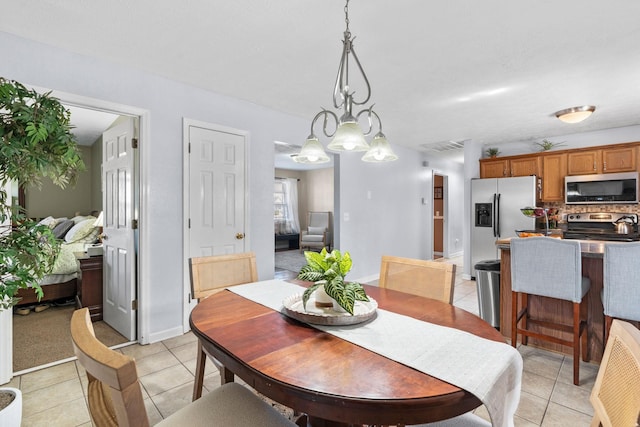 dining room with light tile patterned floors