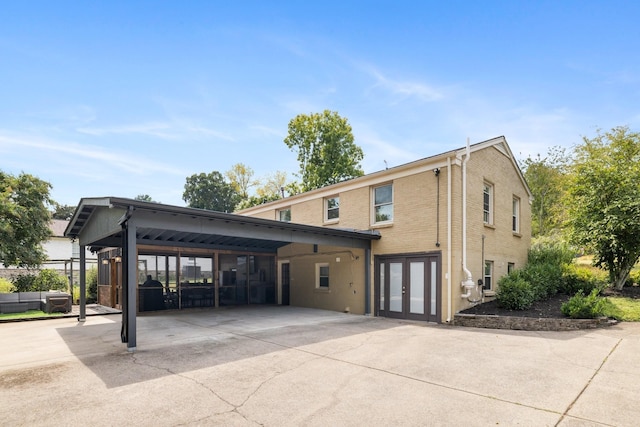 exterior space featuring a carport