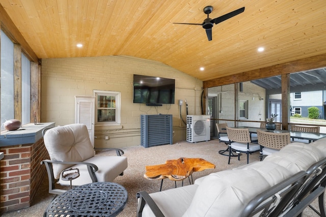 living room featuring wooden ceiling, washer / clothes dryer, ceiling fan, and lofted ceiling