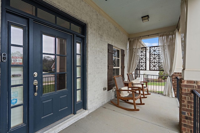 doorway to property with covered porch