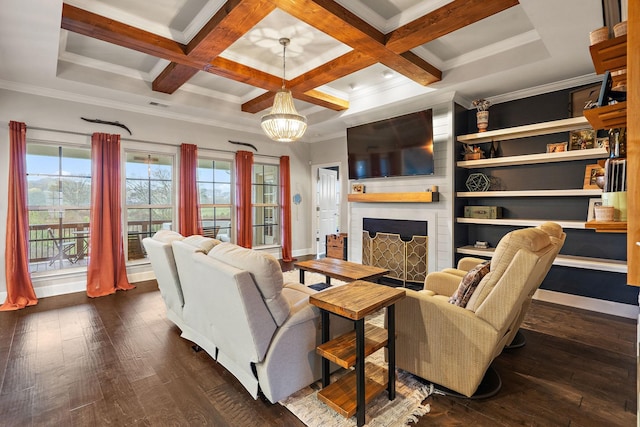 living room featuring a large fireplace, coffered ceiling, dark hardwood / wood-style flooring, a notable chandelier, and crown molding