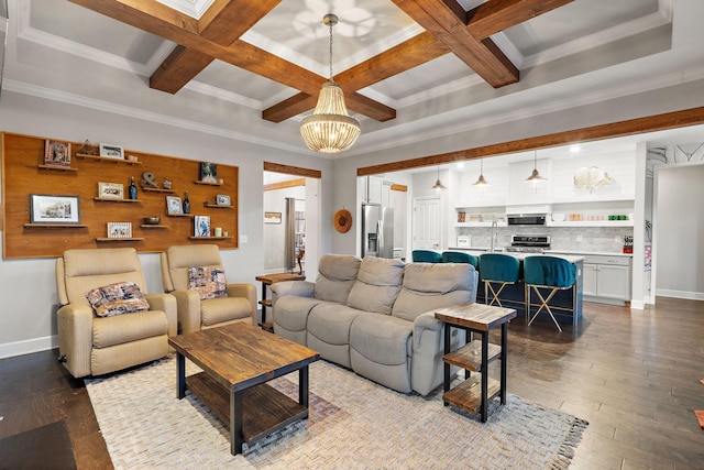 living room featuring ornamental molding, light hardwood / wood-style floors, and coffered ceiling