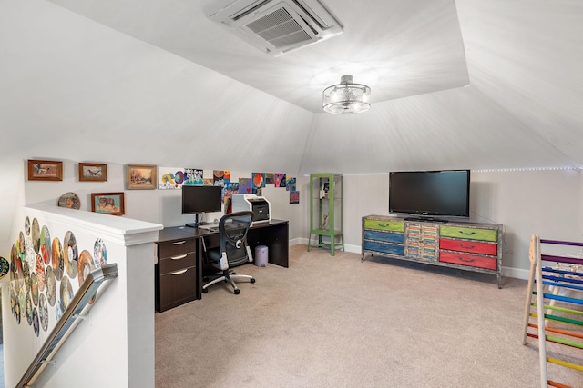 carpeted office space with lofted ceiling