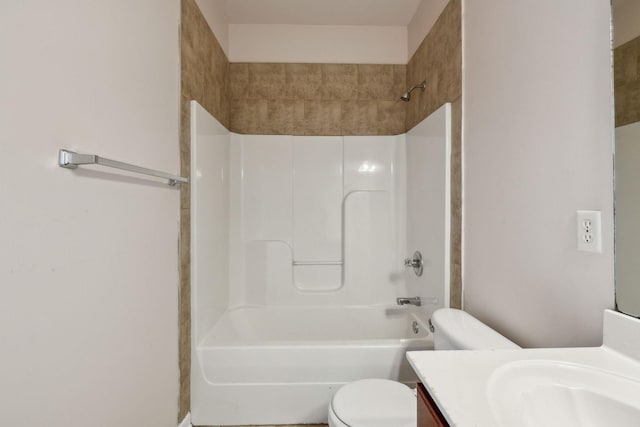 full bathroom featuring shower / tub combination, vanity, and toilet