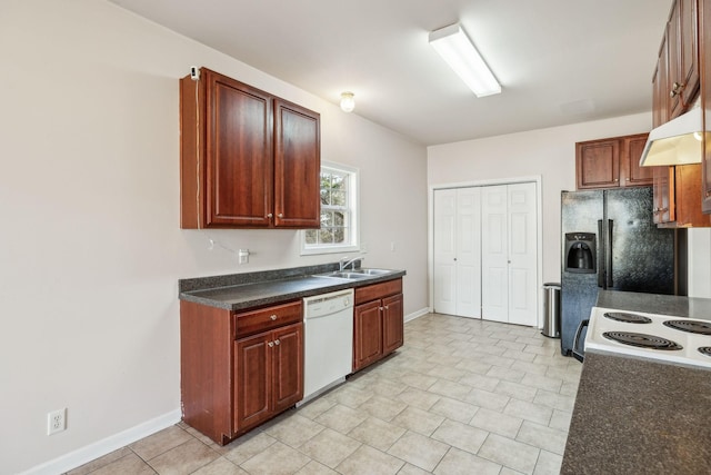 kitchen featuring custom range hood, sink, and white appliances