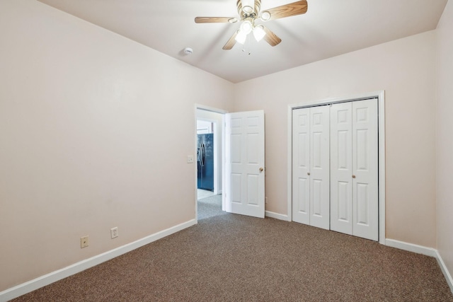 unfurnished bedroom featuring ceiling fan, carpet floors, and a closet