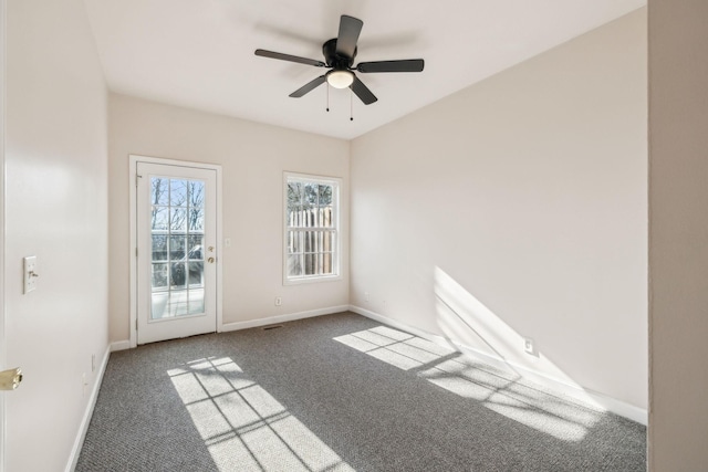 carpeted empty room with ceiling fan