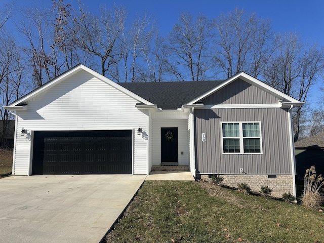 view of front of home with a garage