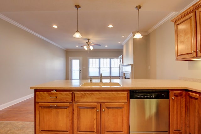 kitchen featuring kitchen peninsula, crown molding, sink, and stainless steel dishwasher