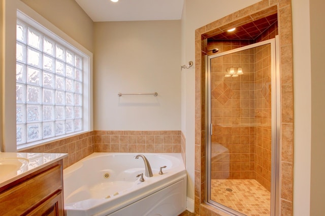 bathroom featuring vanity and plus walk in shower