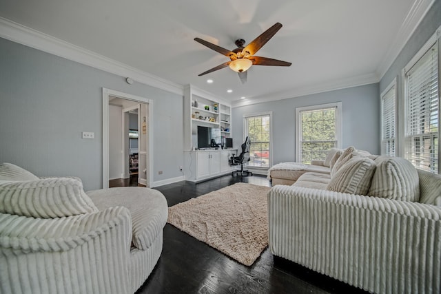 living room featuring ceiling fan, dark hardwood / wood-style flooring, ornamental molding, and built in shelves