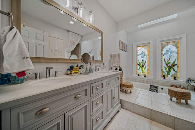 bathroom featuring a tub and vanity