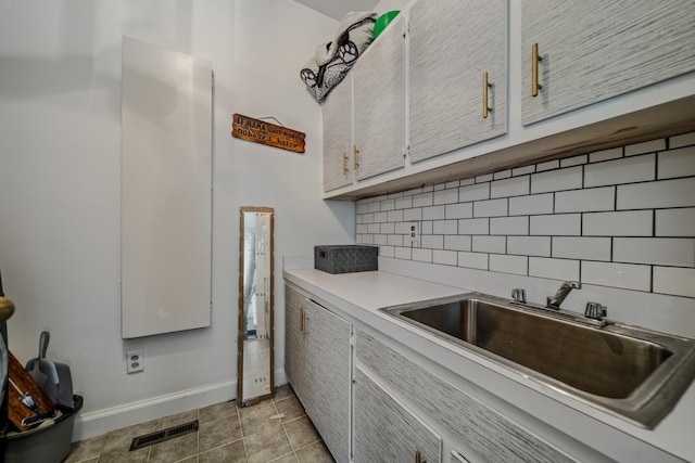 laundry area featuring sink