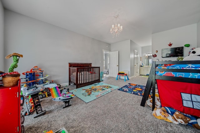 bedroom featuring carpet flooring and a chandelier