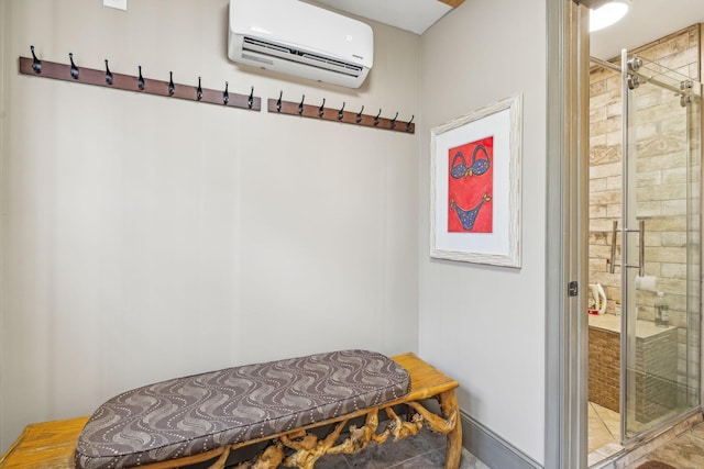 mudroom with a wall mounted AC