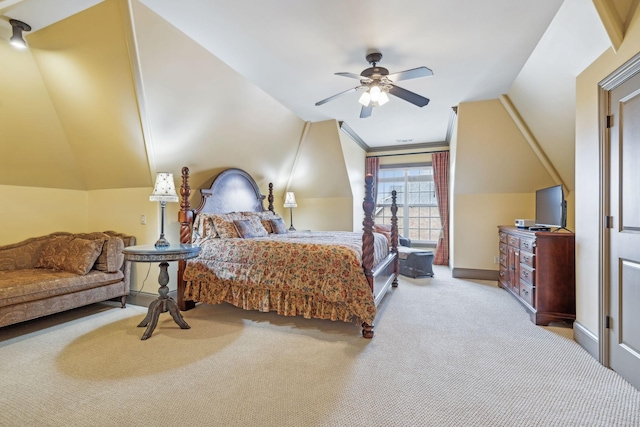 bedroom with ceiling fan, light colored carpet, lofted ceiling, and ornamental molding