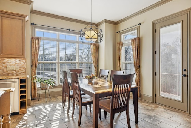 dining area with crown molding