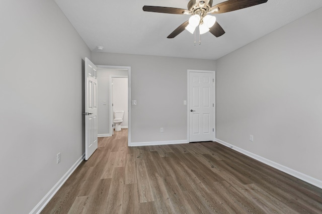 unfurnished bedroom with hardwood / wood-style floors and ceiling fan