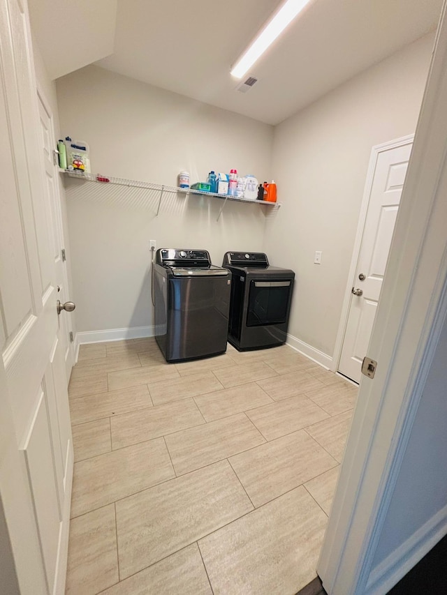 laundry room with washer and clothes dryer